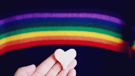 rainbow with heart in hand